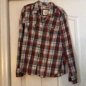 Red white and blue plaid button up shirt.